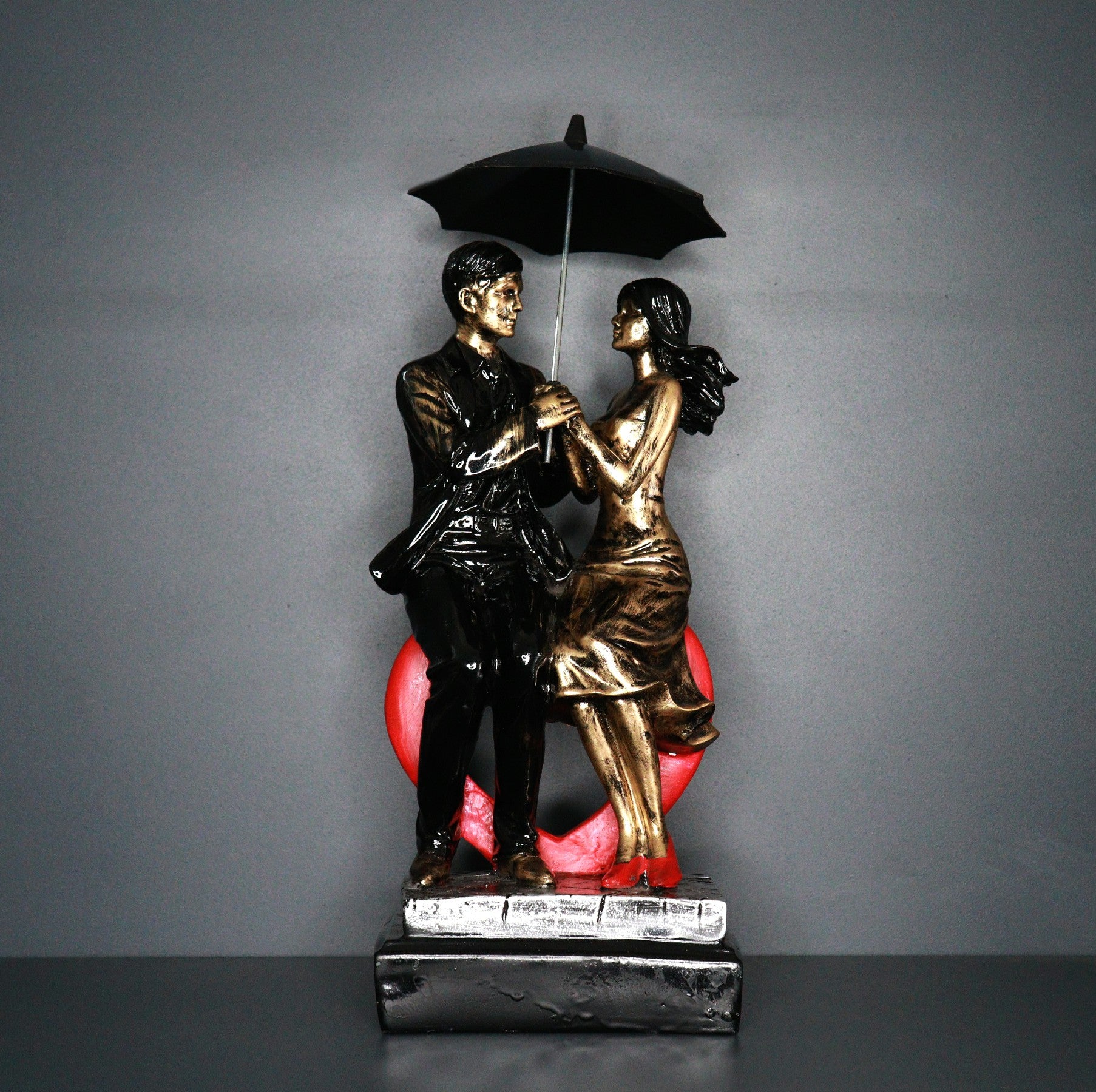 Polyresin Couple under Umbrella Sitting Pose